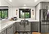 Kitchen 1: Bosch appliances, Keurig, air fryer, Crockpot, blender, tableware, main floor