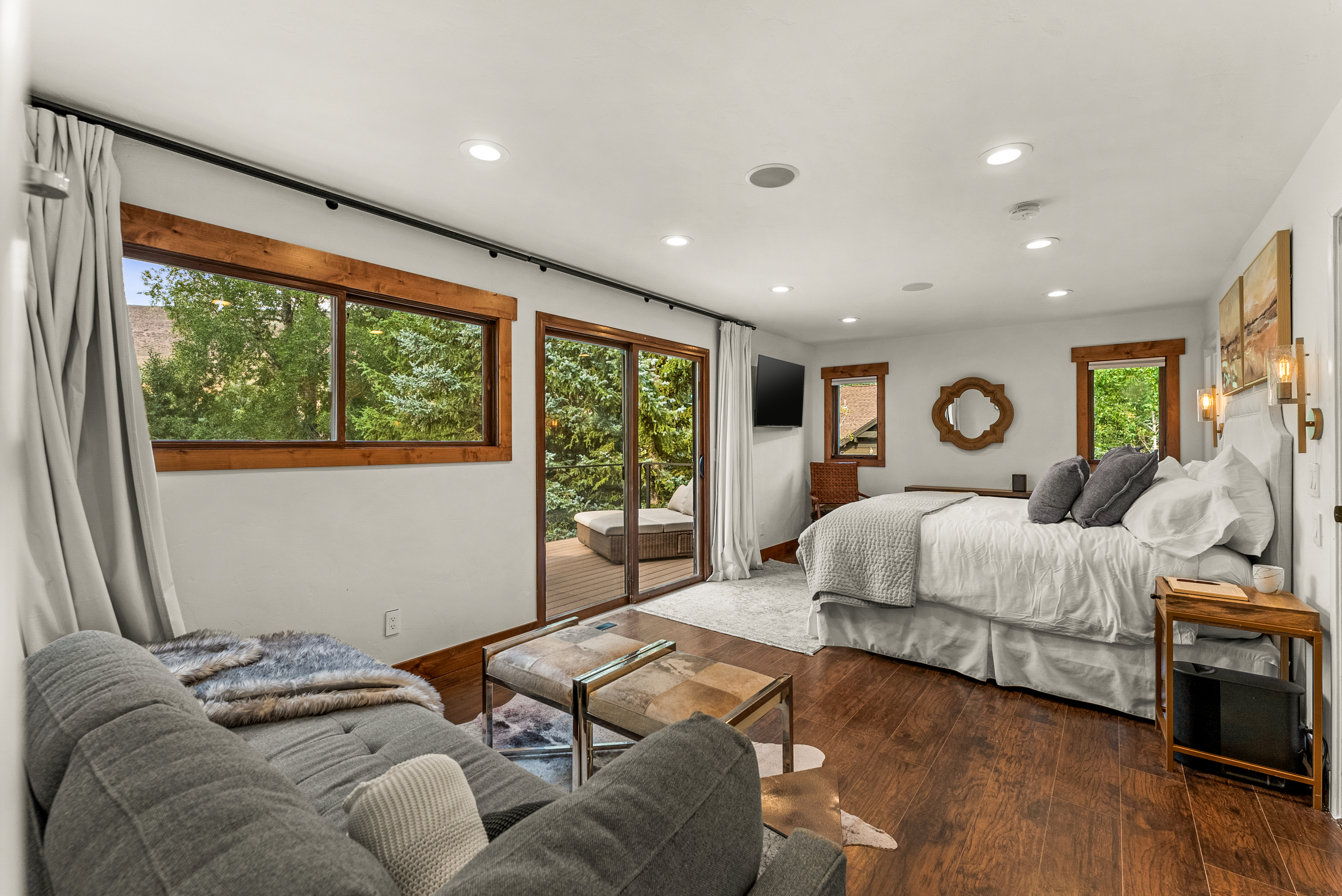 Bedroom 1: California king bed, walk-in closet, couch, private balcony, en-suite bathroom, upper floor