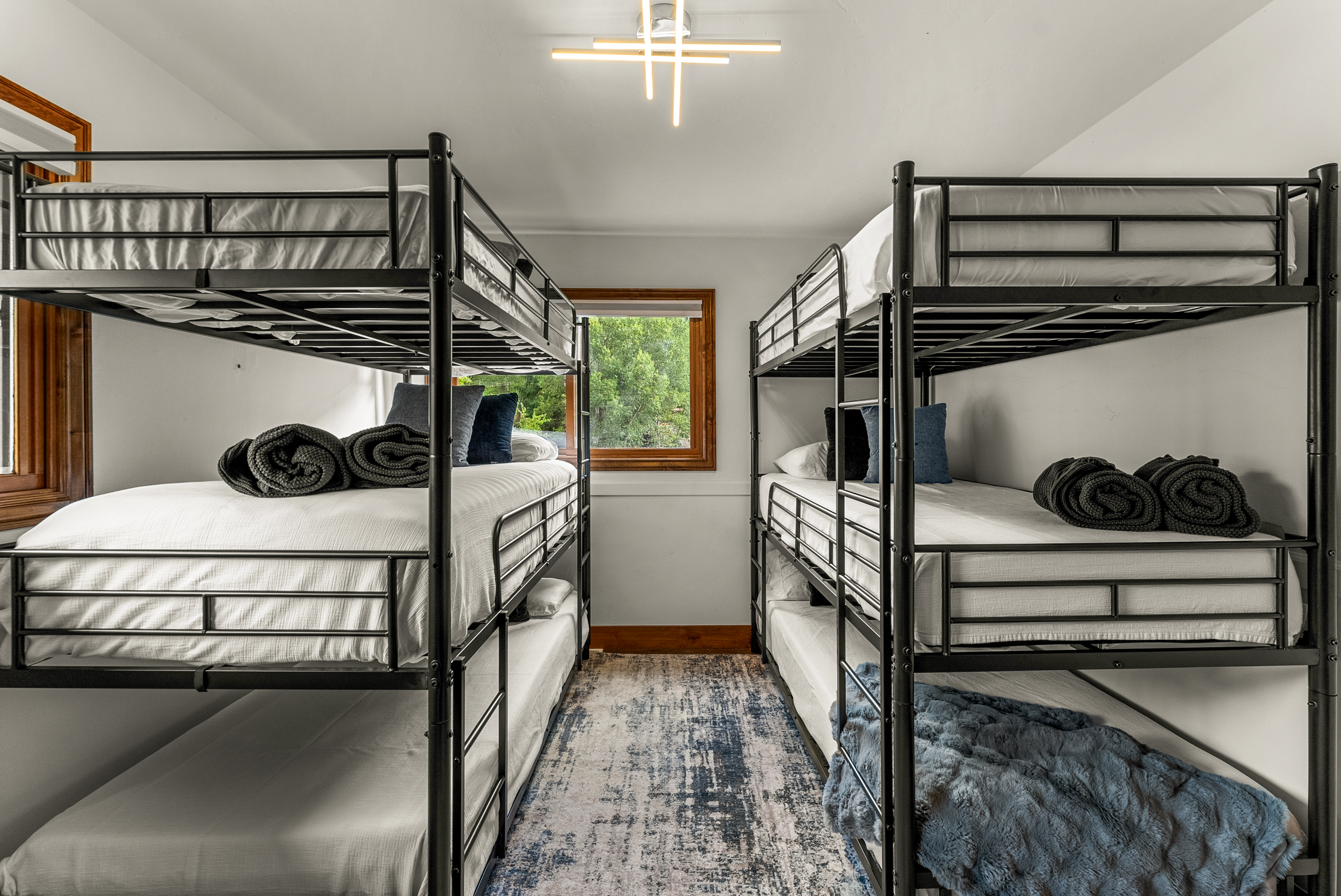Bedroom 6: 2 sets of triple twin bunk beds, upper floor