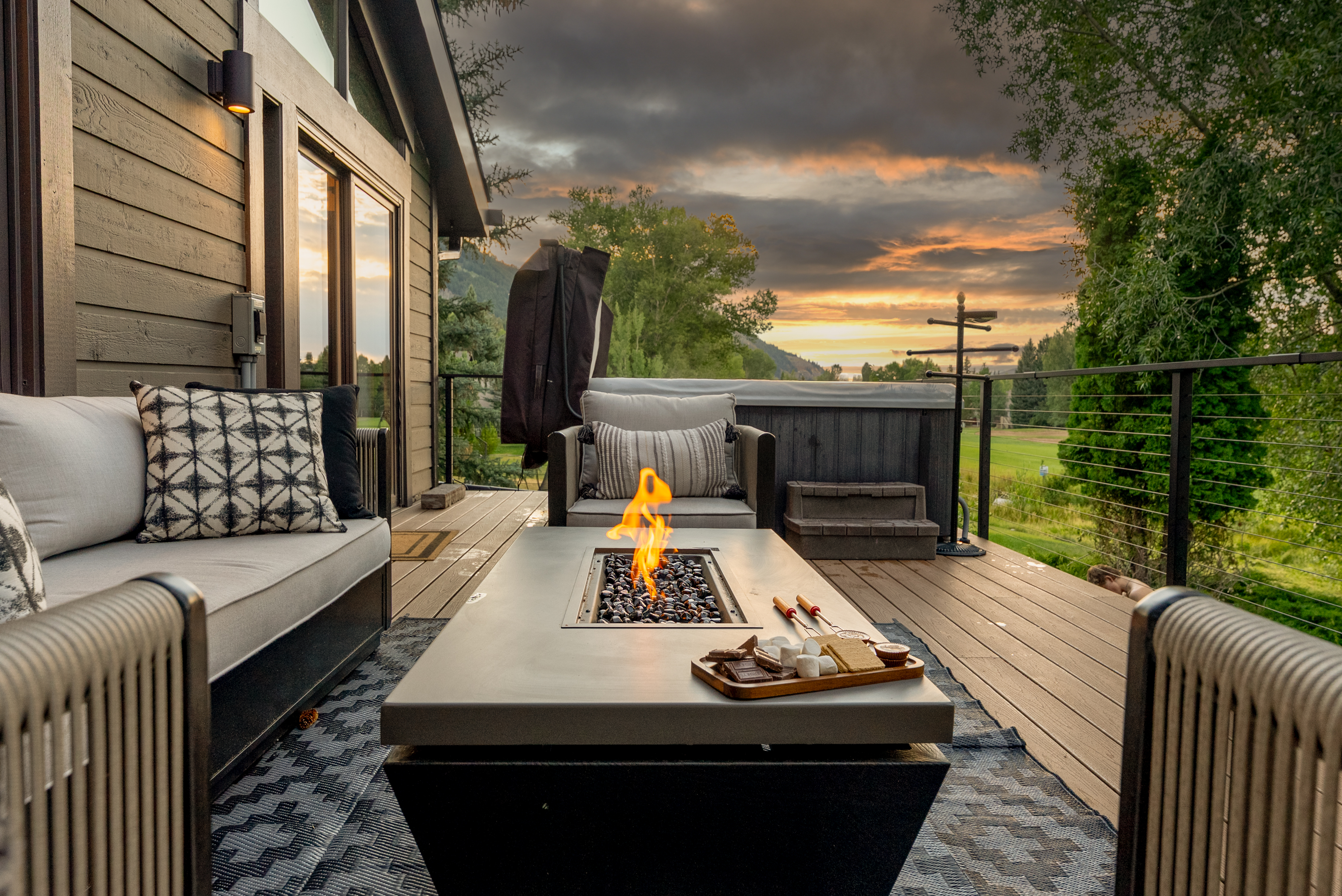 Patio: 8-person private hot tub, gas grill, outdoor gas fireplace, seasonal creek