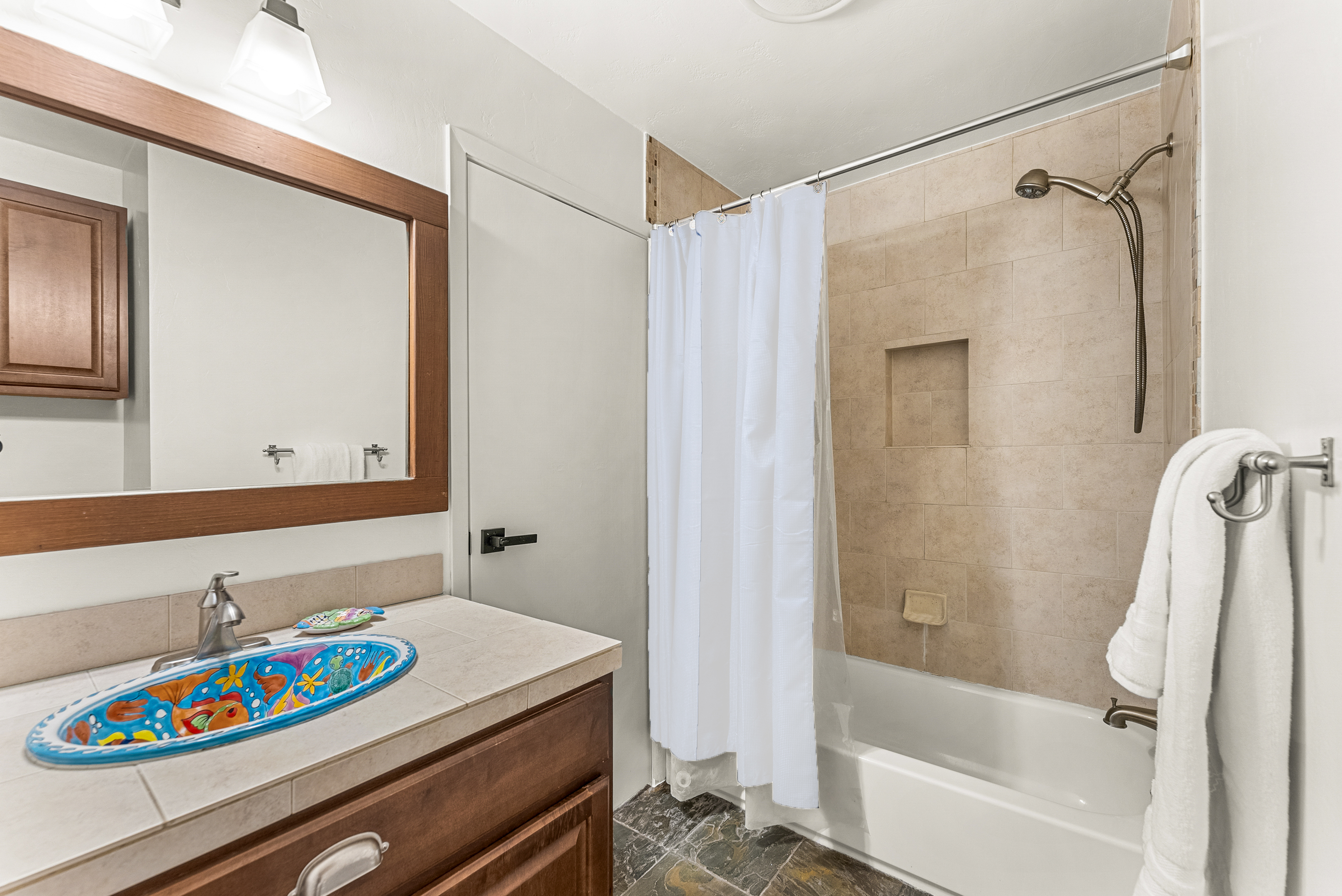 Bathroom 2: Tub, shower, shared upper floor