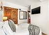 Bedroom 2: Queen bed, lower floor