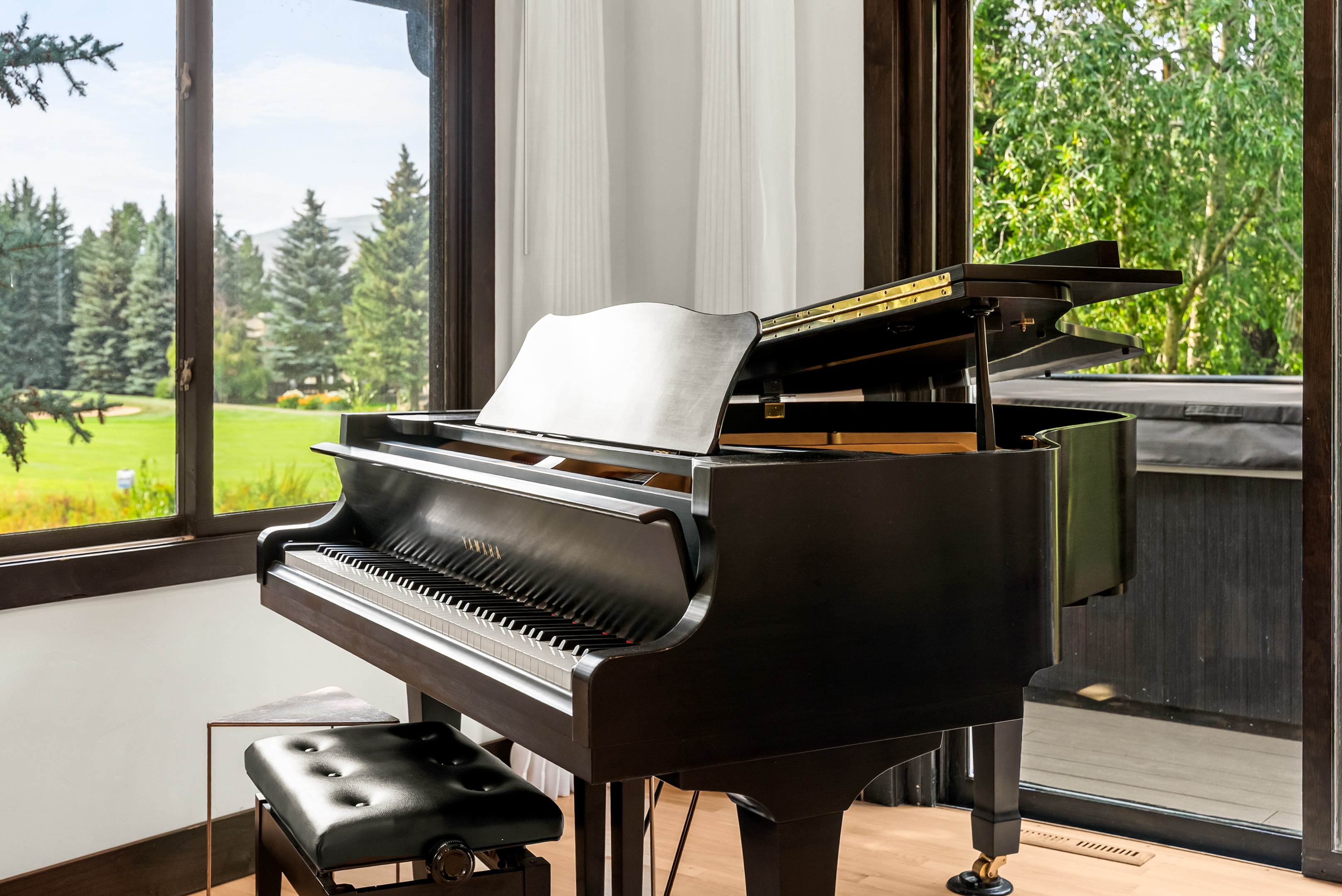 Beautiful piano in main living room area
