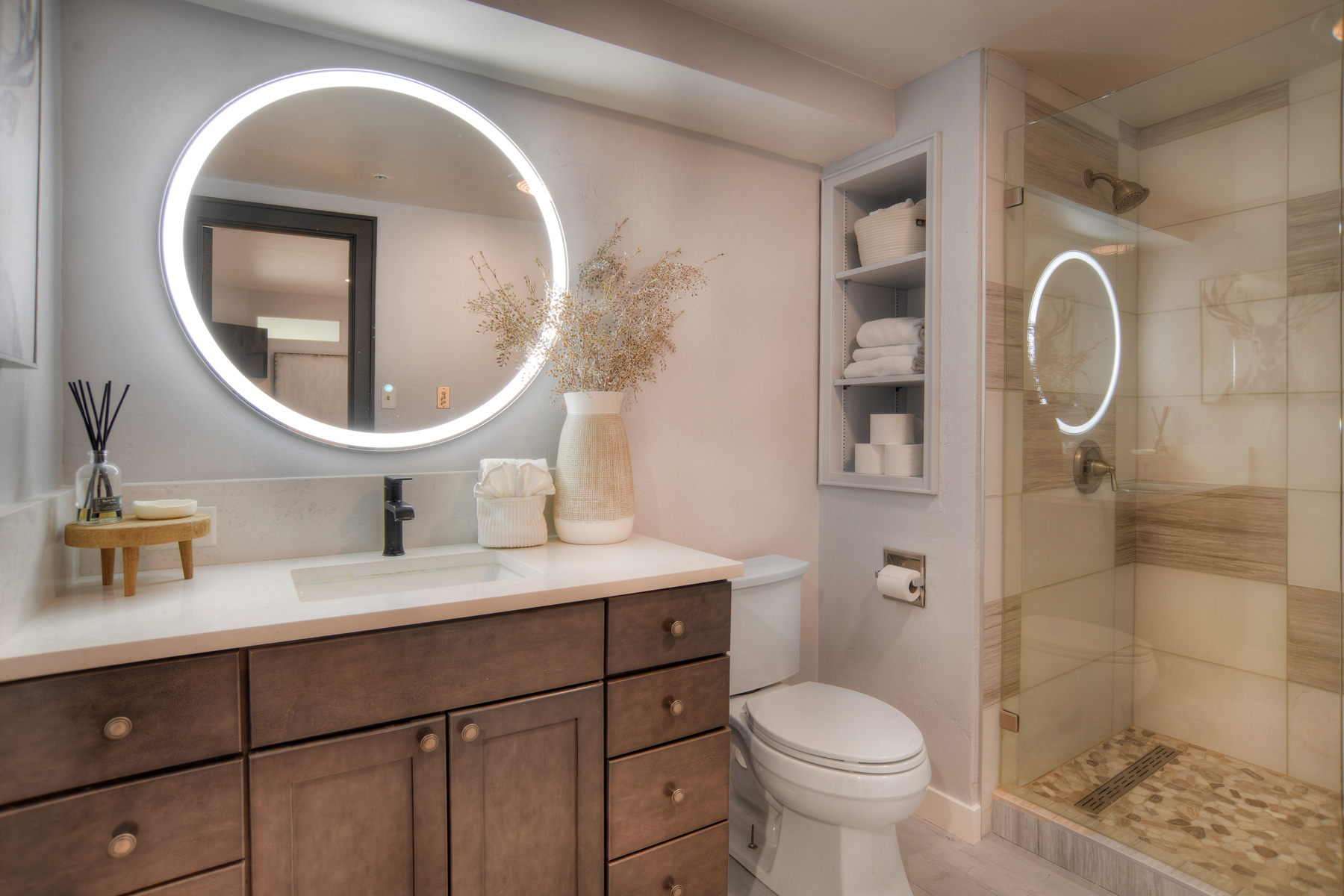 Full bathroom featuring a sleek walk-in shower.