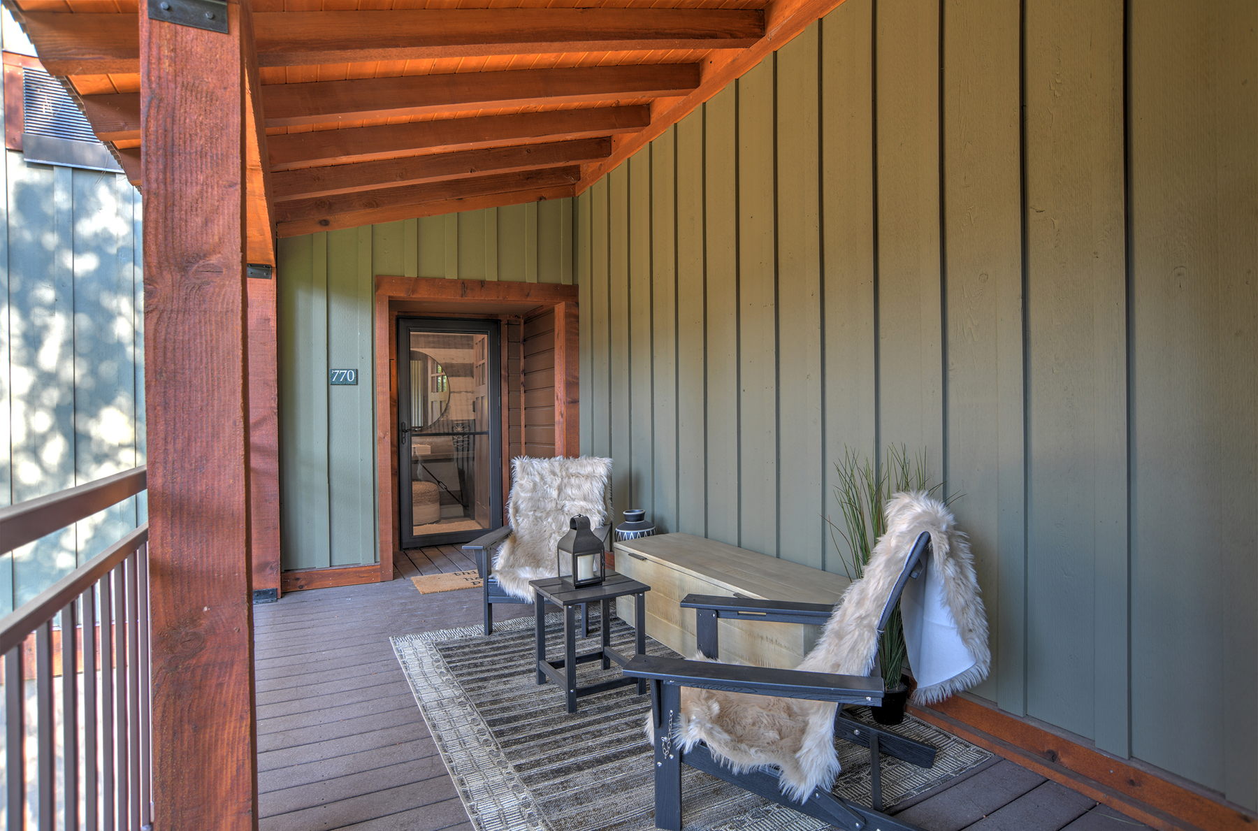 Outdoor lounge area on the front deck.