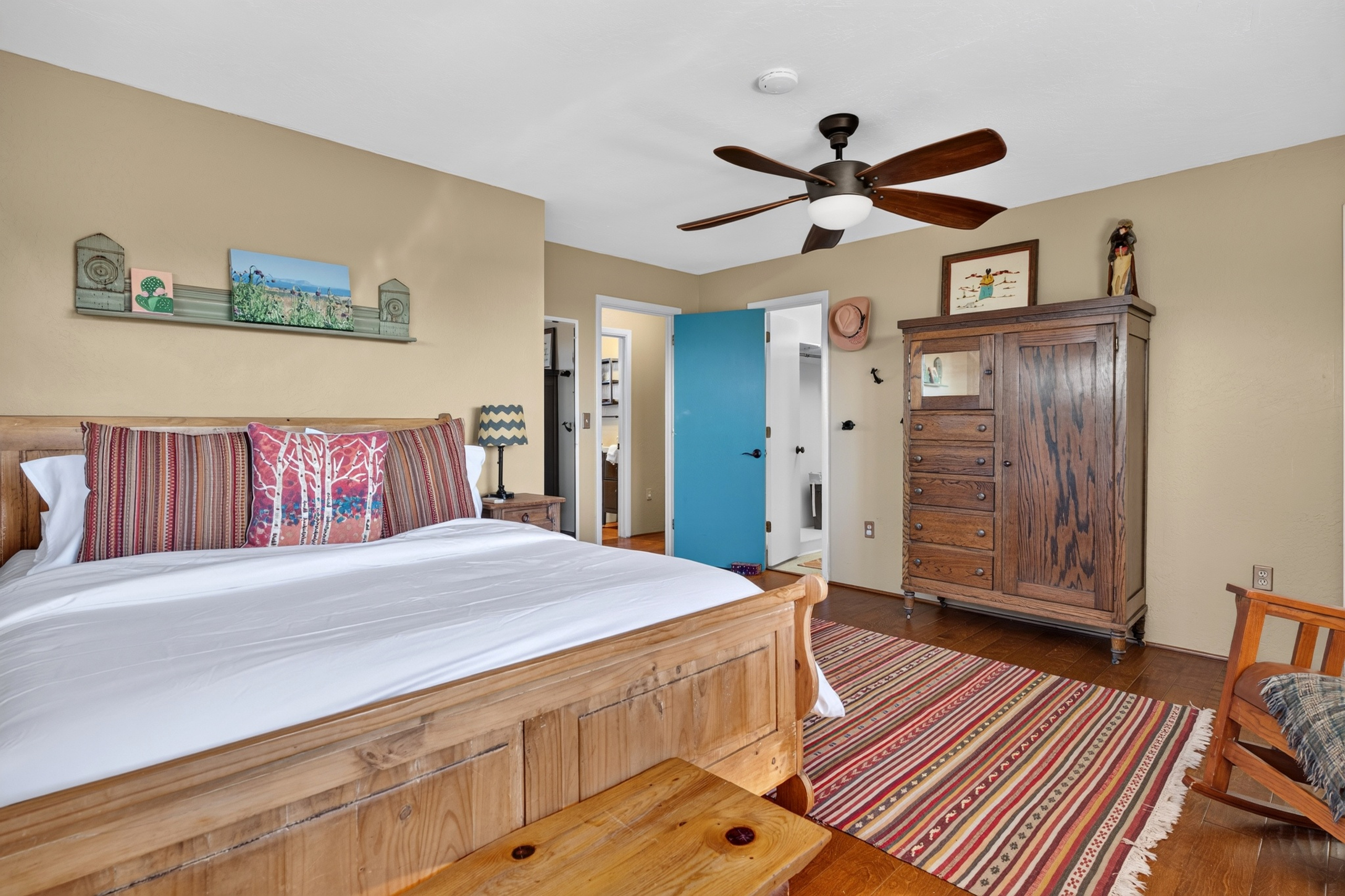 Main King bedroom with en suite bathroom and private deck access.