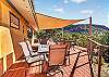 Expansive deck with grill and outdoor dining area