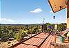 Expansive deck with grill and outdoor dining area
