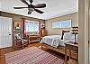 Bedroom 1: Queen Bed with ensuite bathroom and private deck access (Main Level).