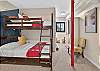 Bedroom 4: Two Twin-over-Full Bunk Beds (Lower Level)