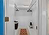 Queen bedroom walk-in closet.