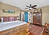 Bedroom 1: Queen Bed with ensuite bathroom and private deck access (Main Level).