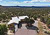 The home is surrounded by mountain views.