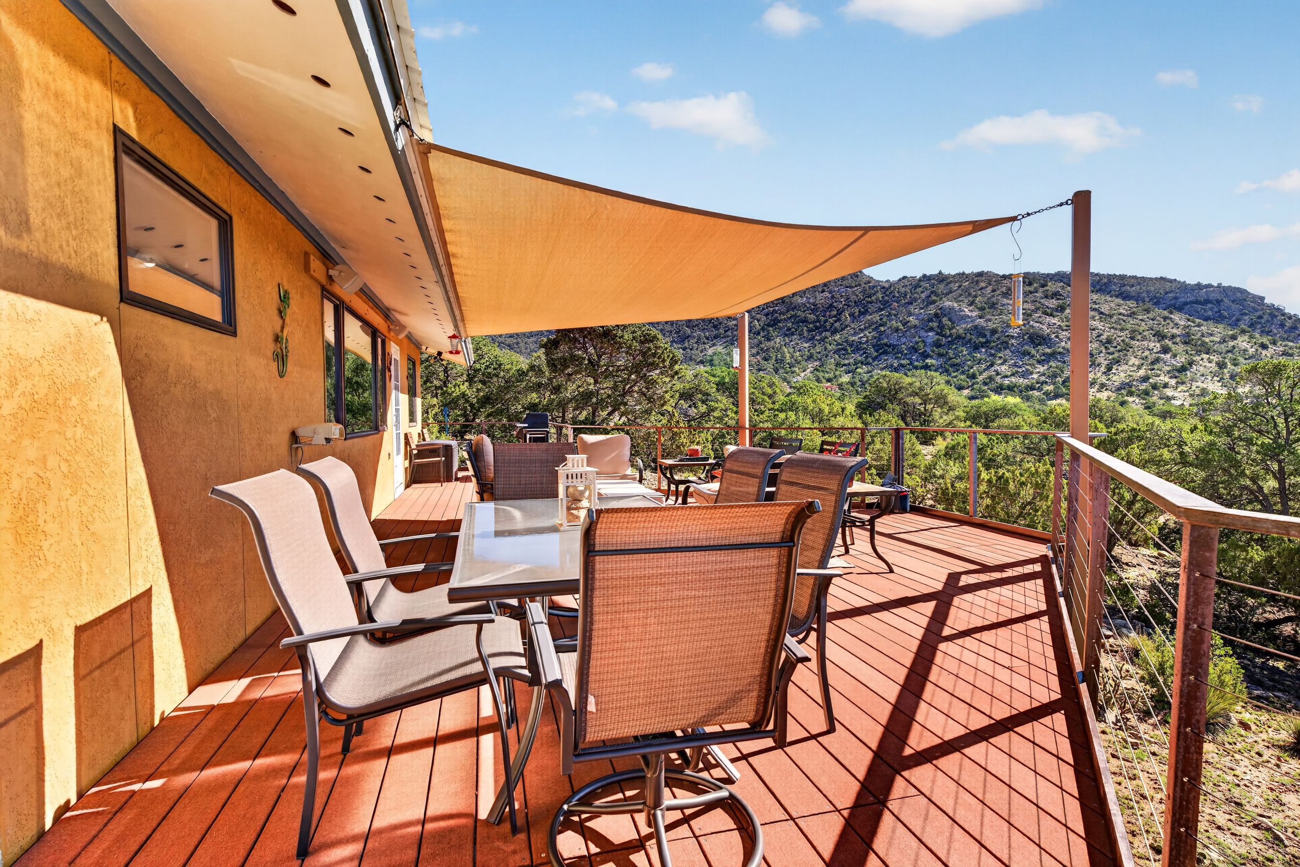Expansive deck with grill and outdoor dining area