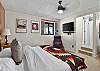Bedroom 3: King bedroom with ensuite bathroom (Lower Level)