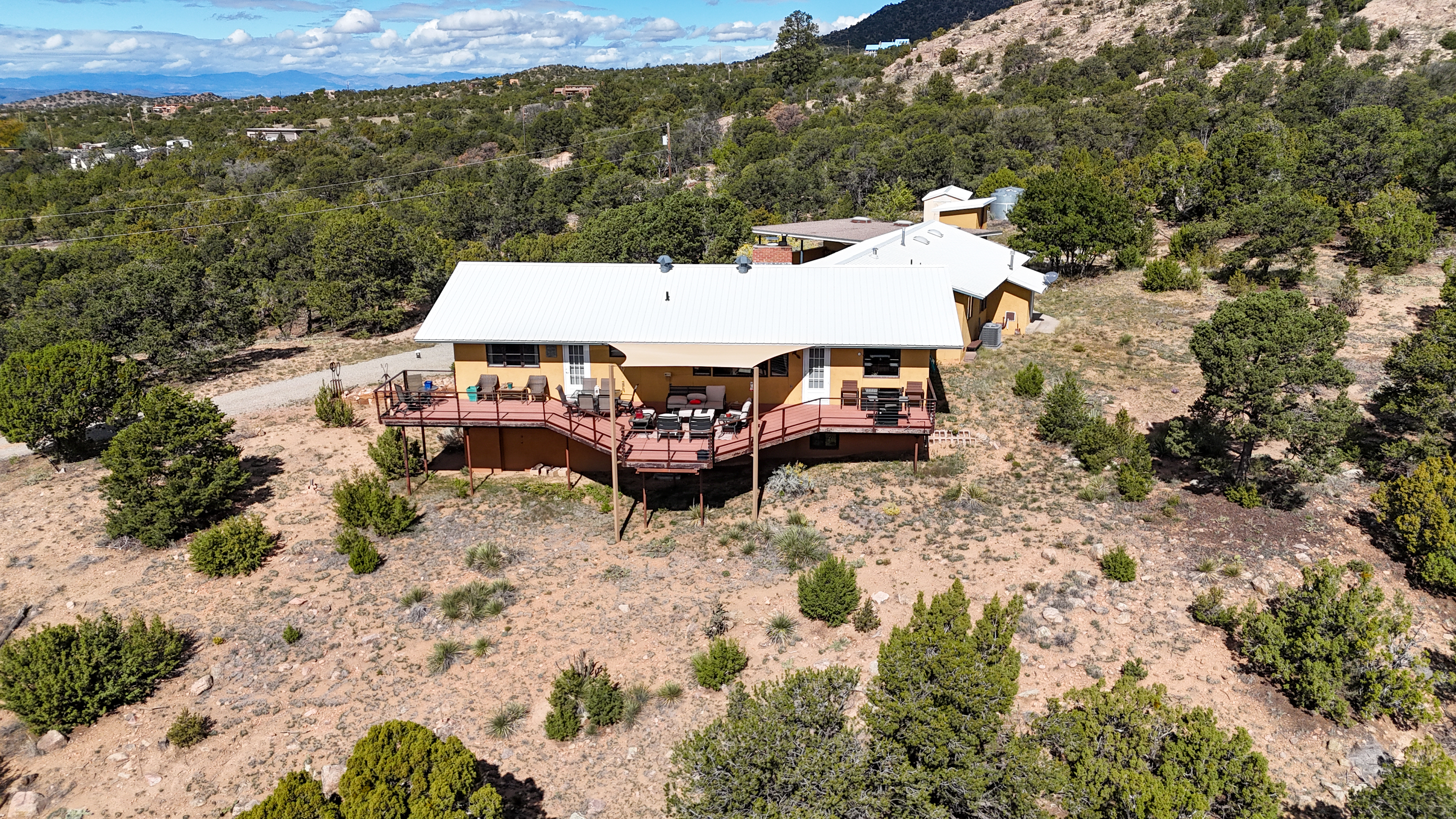The home is surrounded by mountain views.