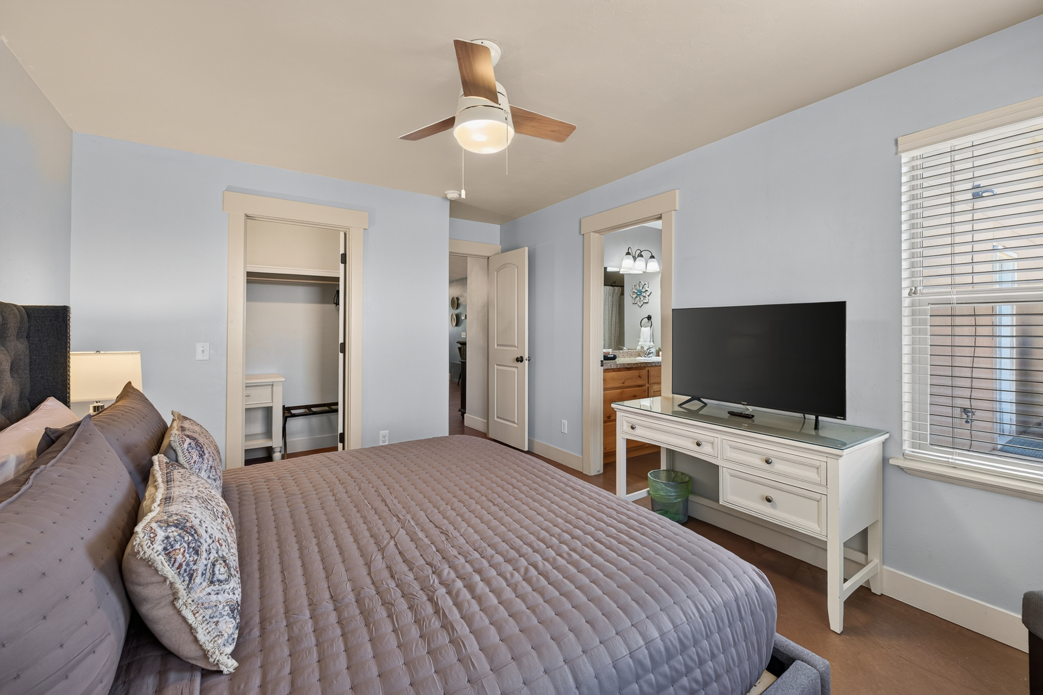 master bedroom with brand new king bed and attached bath