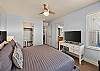 master bedroom with brand new king bed and attached bath
