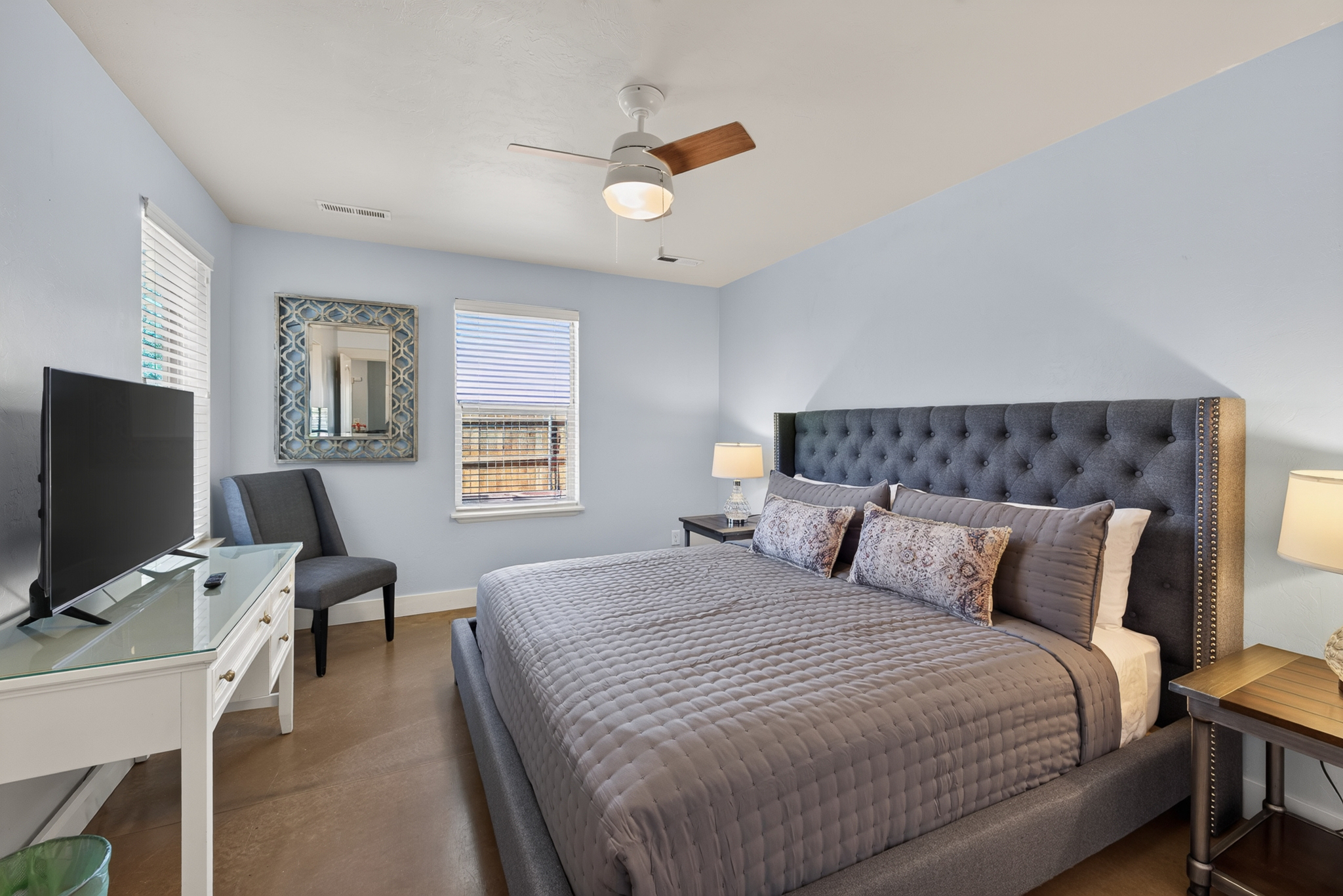 master bedroom with brand new king bed and attached bath