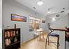 Gather comfortably with dining space for 2 guests and additional breakfast bar seating.