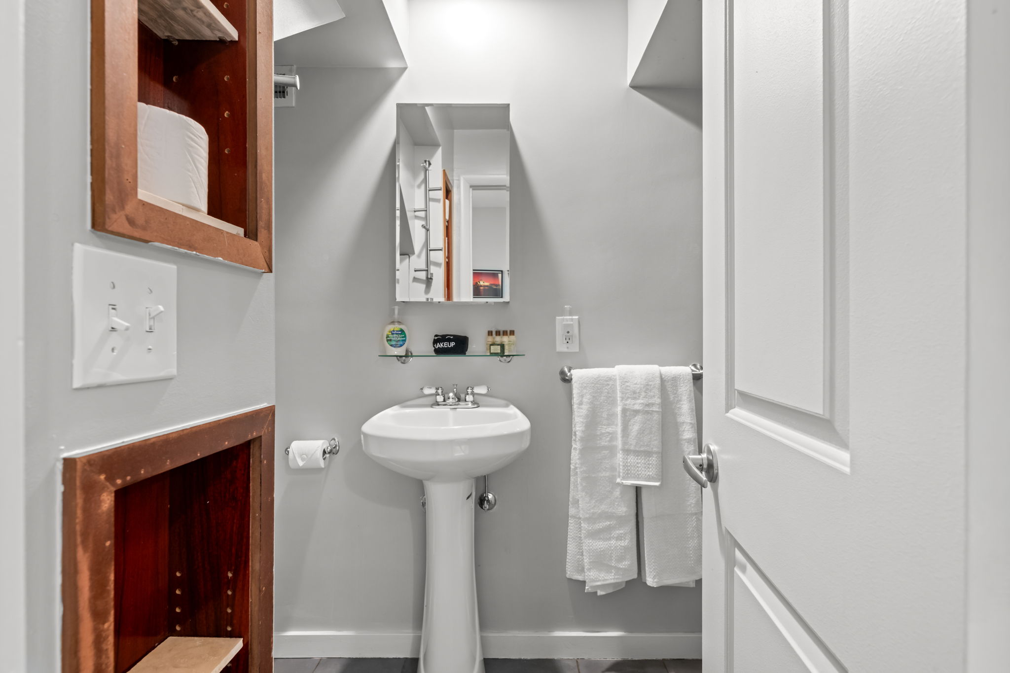 Full bathroom featuring a sleek walk-in shower.