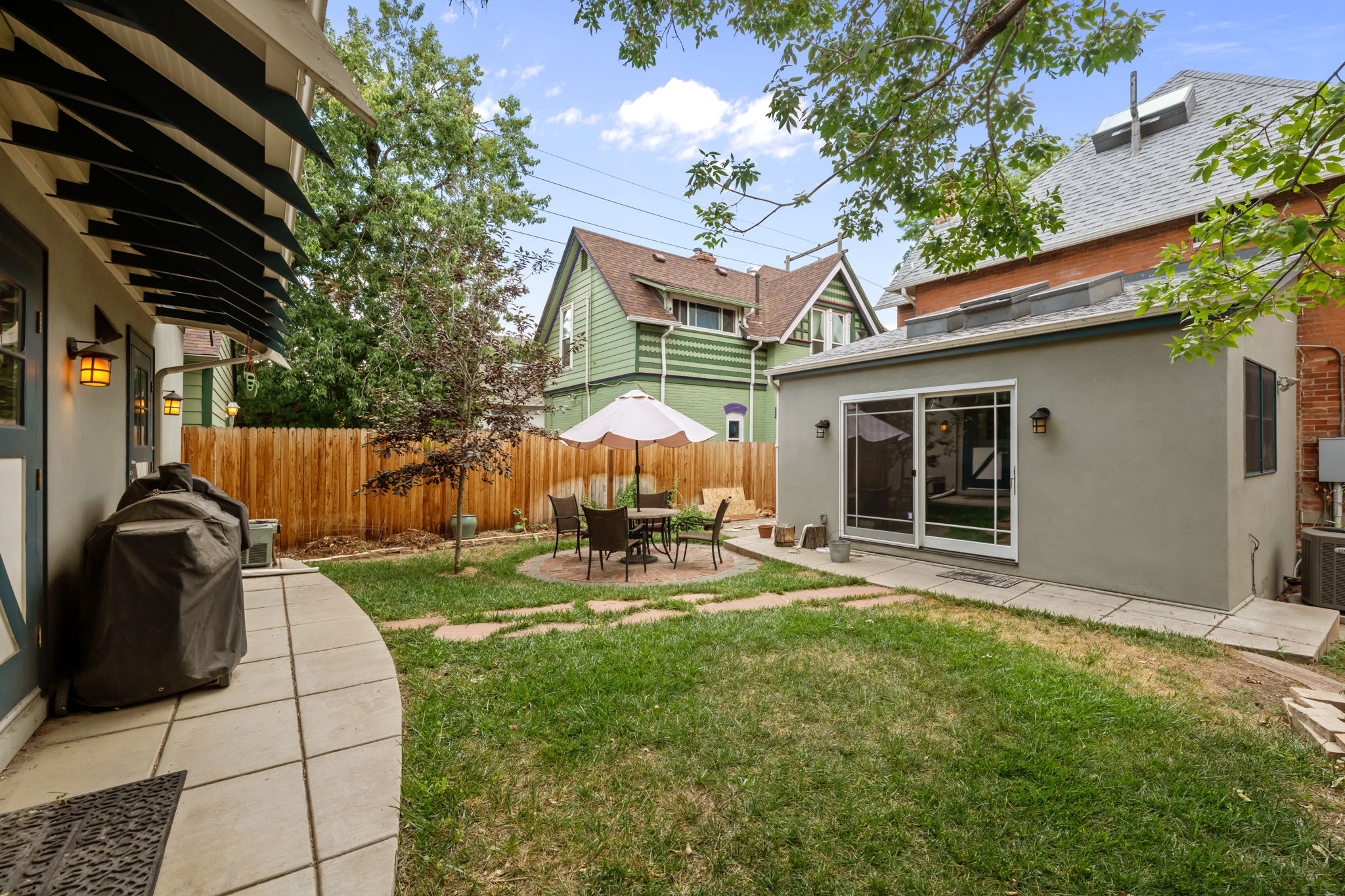 Gather, grill, and unwind in the fenced backyard. 