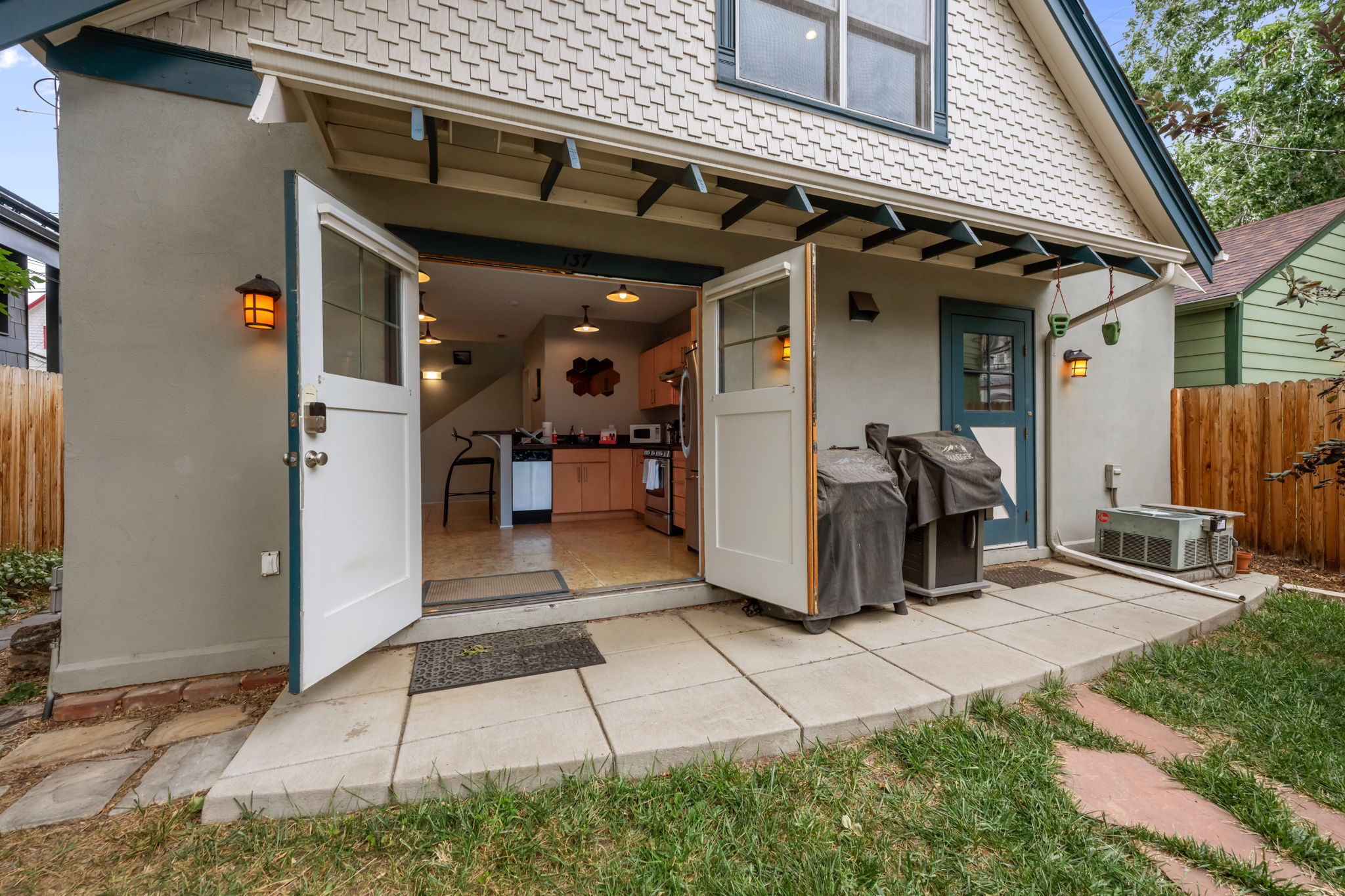 Large barn doors welcome you into the home.