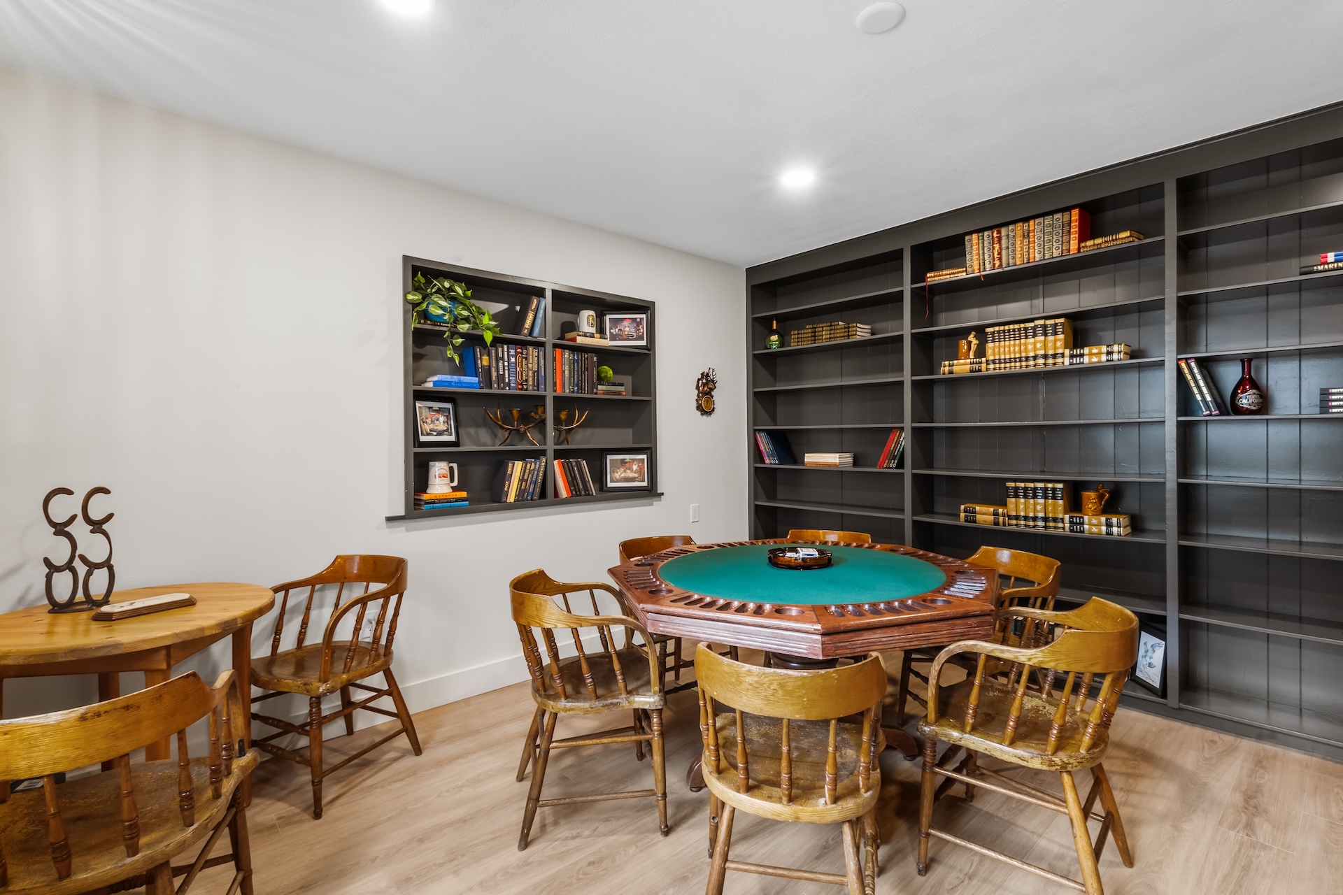 Gather around the poker table or curl up with a good book in the game room/library.