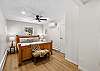 Second ensuite bedroom with one king bed and private full bathroom – located on upper level (3rd floor).