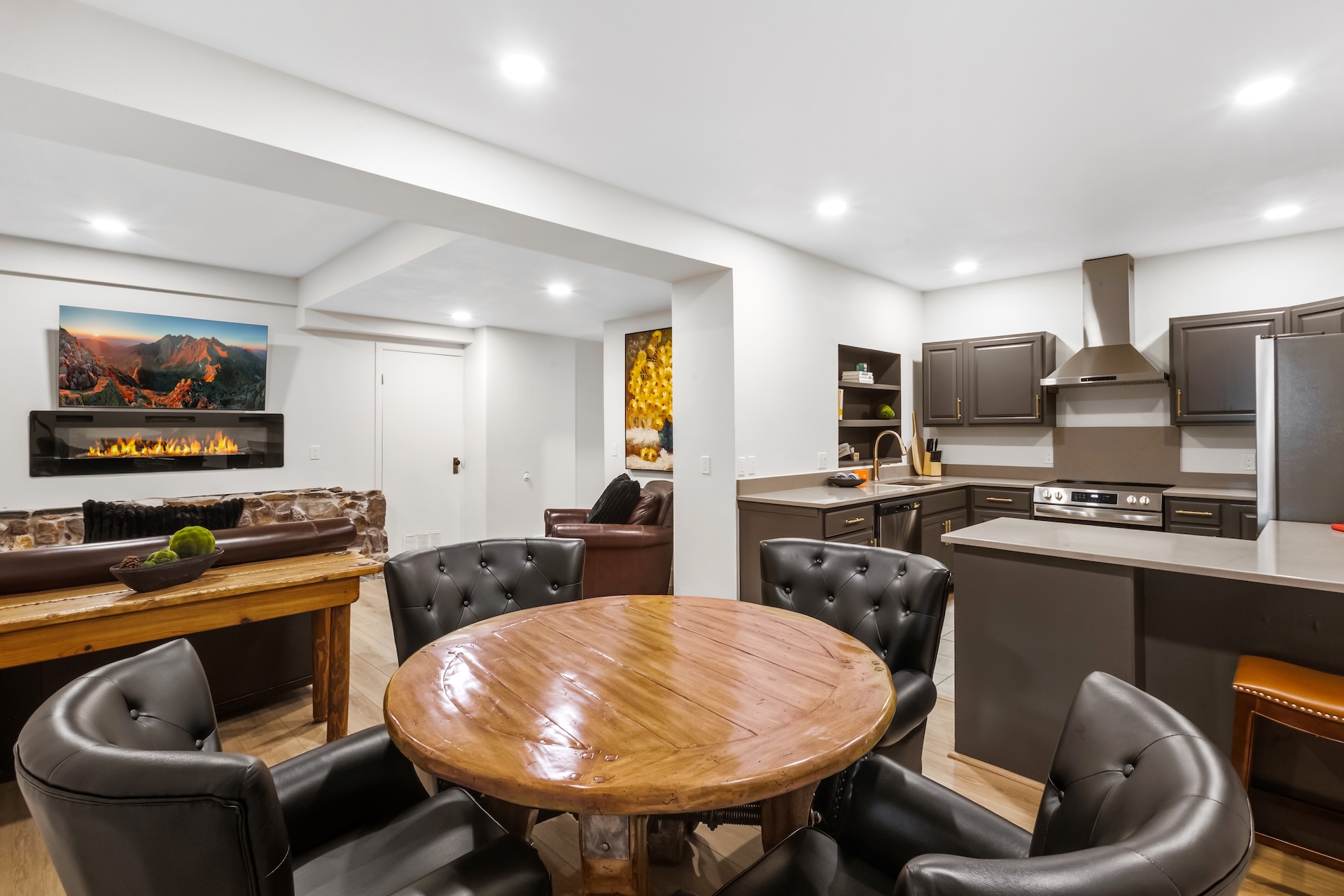 Living room area and kitchen/dining area #2 – located on the lower level (first floor).