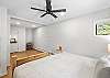 Second ensuite bedroom with one king bed and private full bathroom – located on upper level (3rd floor).