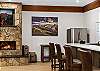 Enjoy a drink next to the fireplace. 