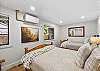 Double queen bedroom – located on the lower level (first floor).