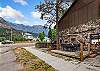 Lower side deck with outdoor dining space for 6 and mountain views.