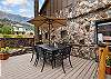 Lower side deck with outdoor dining space for 6 and mountain views.