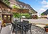 Lower side deck with outdoor dining space for 6 and mountain views.
