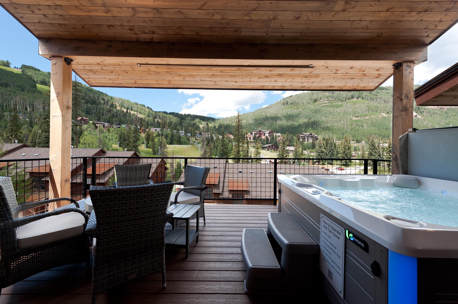 Deck off the Main Living Space with a private hot tub, gas firepit and a BBQ.