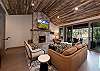 Main Living Space- Gas Fireplace, TV and Deck