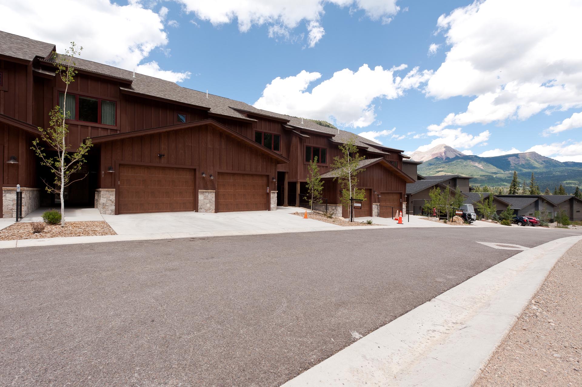 Exterior view of the townhome with views of Engineer Mountain