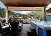 Deck off the Main Living Space with a private hot tub, gas firepit and a BBQ.