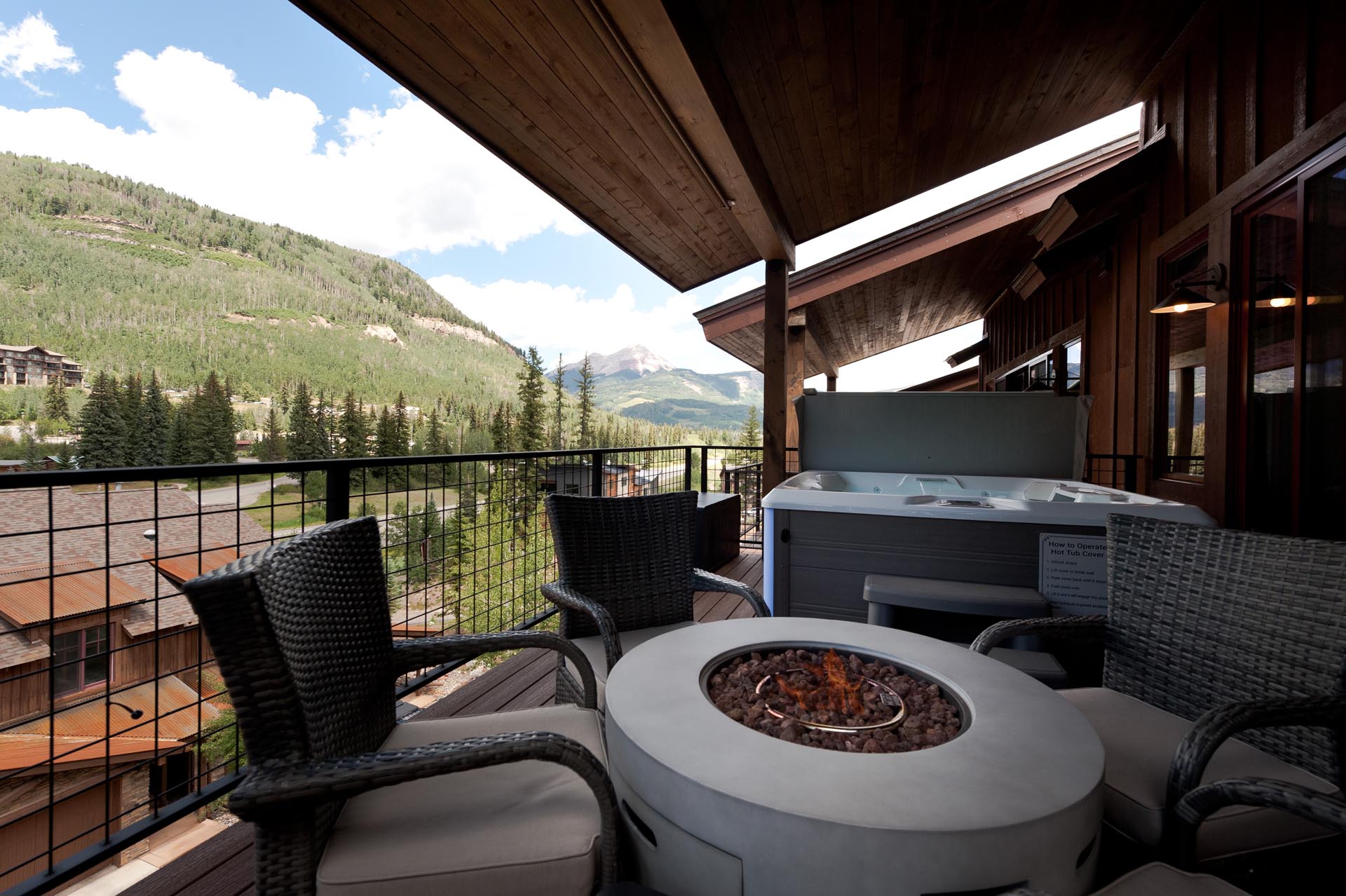 Deck off the Main Living Space with a private hot tub, gas firepit and a BBQ.