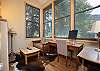 Office area with desk and chair – convenient space for remote workers. 