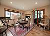 Gather comfortably with dining space for 4 guests + breakfast bar seating for 3.