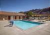 community pool and hot tub area. Pool open seasonally