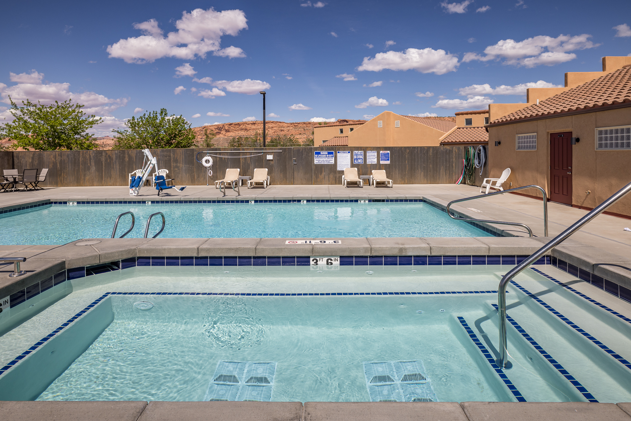 community pool and hot tub area. Pool open seasonally