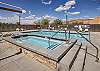community pool and hot tub area. Pool open seasonally