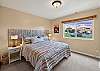 Guest King (or two twin) bedroom with gorgeous views out the window! There is a conversion kit available if guests would like to use the king bed option for their stay. 