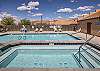 community pool and hot tub area. Pool open seasonally