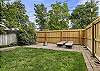 Lay out and enjoy the sun, or gather around the fire pit in the fenced backyard.