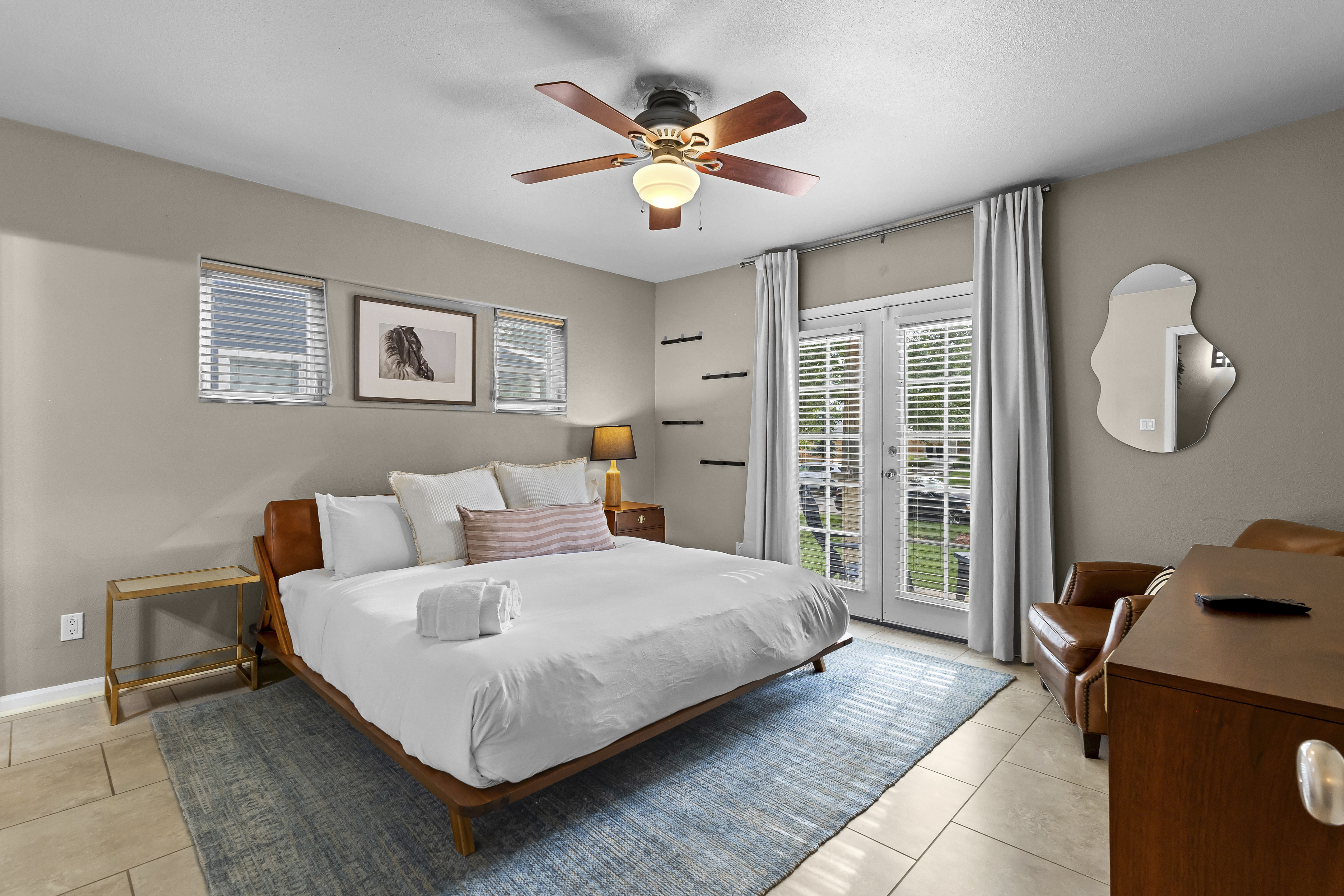 Unwind in this spacious king bedroom with a Smart TV and en suite bathroom.